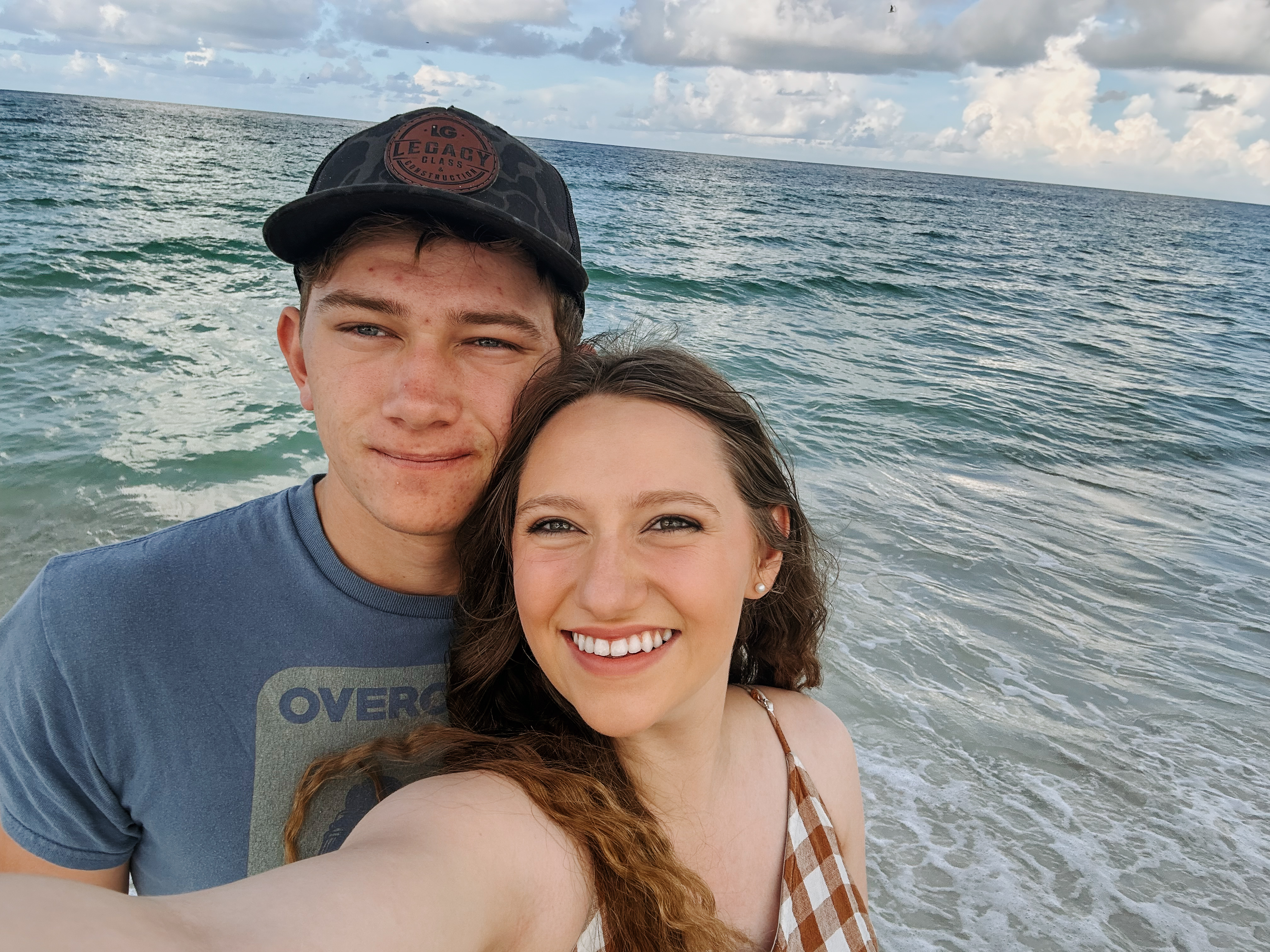 Couple walking along the beach